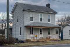 Before Roof & Siding Replacement